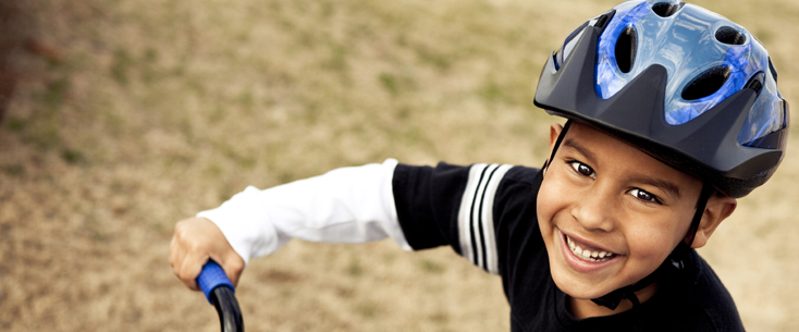 Boy on bike photo